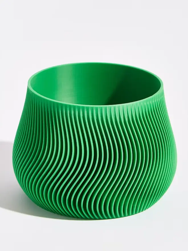 Sustainable 3D Printed Bamboo Green Plant Pot, groovy design against a white background. 