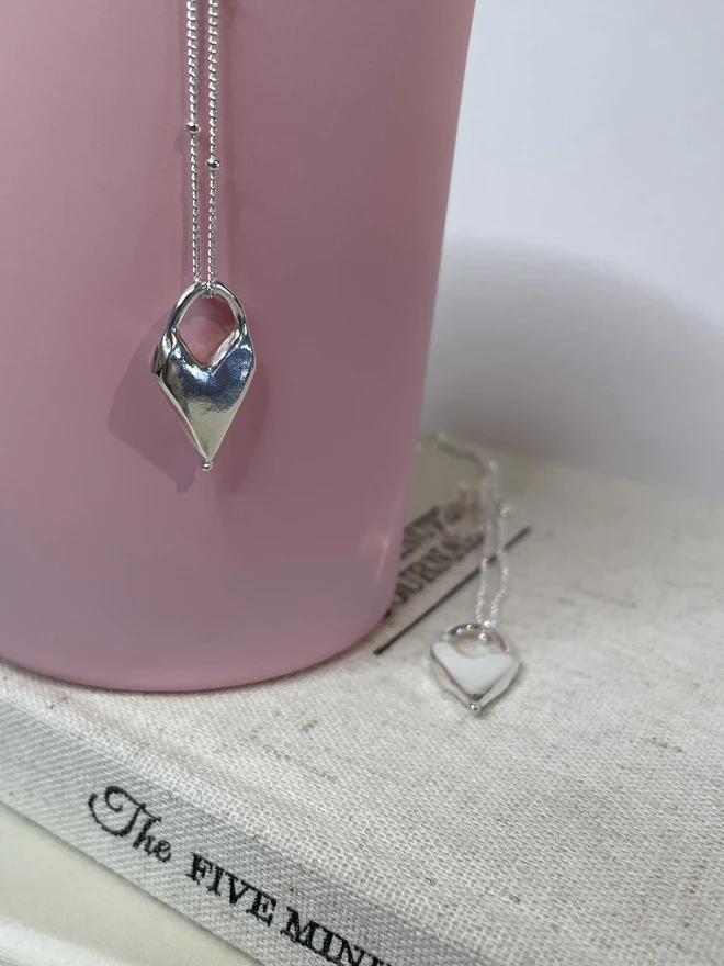 Hand made heart charms made from 100% recycled sterling silver, cute gift for girlfriend or wife for Valentine's Day or Mother's Day. Send straight to your special someone. Made by Celina C Jewellery, a small business in the UK, find on Holly and Co.