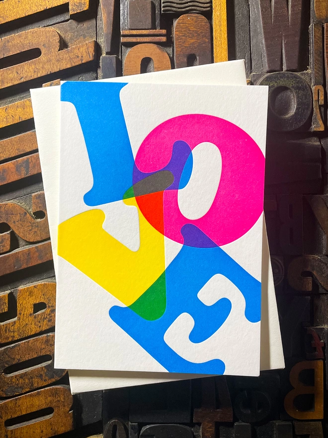 LOVE. Perfect to send a special message to a loved one. Printed with my own fair hands. The card is hand-fed into the press for each of the three colour passes. Striking colours using a deep impression print. Range of matching colours envelope.