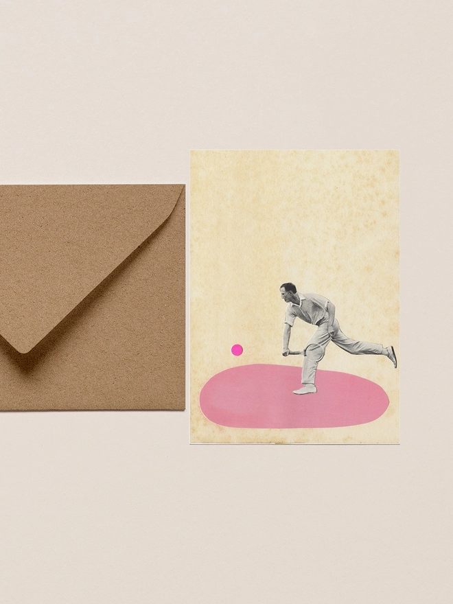 A greeting card depicting a male tennis player hitting a ball. 